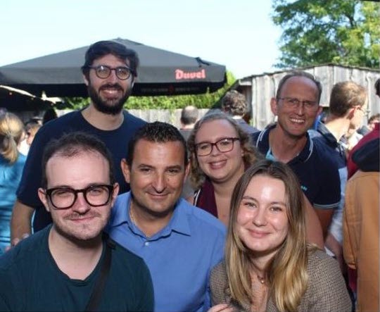 Baxter employees gather together outside