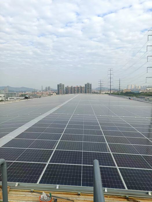 Large solar panels cover the ground